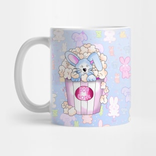 cute blue bunny rabbit in a pot of popcorn on a blue background Mug